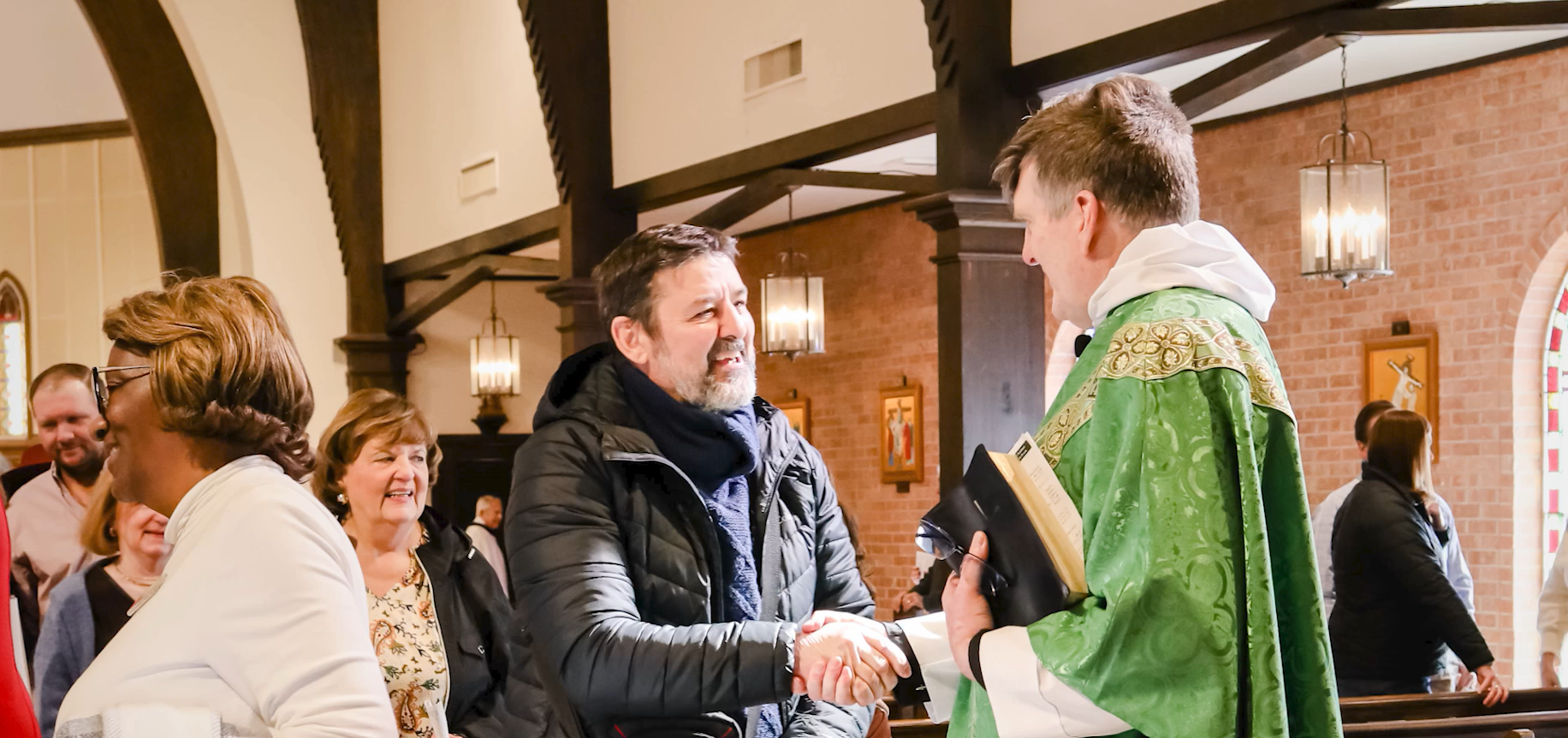 Members welcoming one another at St. Peter's